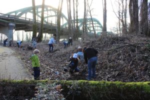 Watershed volunteers plant a variety of plants that will help protect soils, crowd out weeds, and provide habitat for native wildlife.