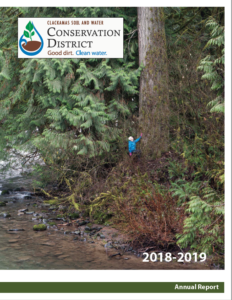 The cover of the 2018-2019 annual report features the Eagle Creek Community Forest.